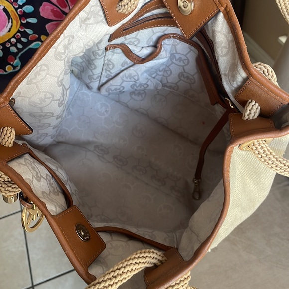 Gently used Gold canvas Michaels Kors bag. - Picture 6 of 6